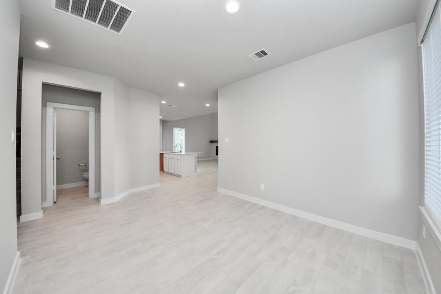 Take another look at the spacious dining room. Sample photo of completed home with similar floor plan. Actual colors and selections may vary.