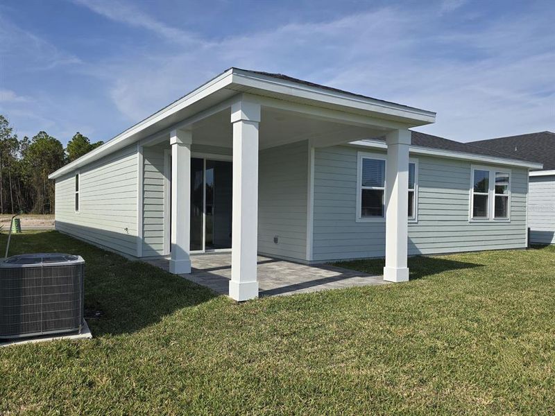 Exterior details and patio area of a home in Colbert Landings, Palm Coast (Image 6).