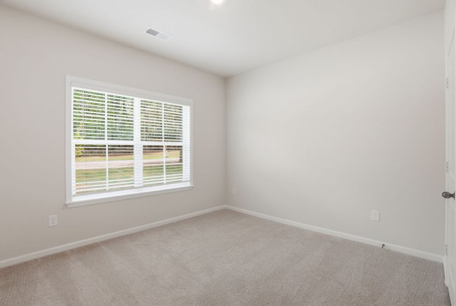 Representative unfurnished interior of a home built from the Magnolia Select M by McGuinn Homes in Broadway Lake, Anderson (Image 16).