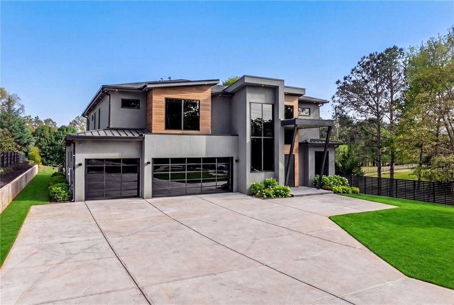Front exterior of a new home in , Sugar Hill, GA, highlighting curb appeal (Image 29). Front exterior of a new home in , Sugar Hill, GA, highlighting curb appeal (Image 29).