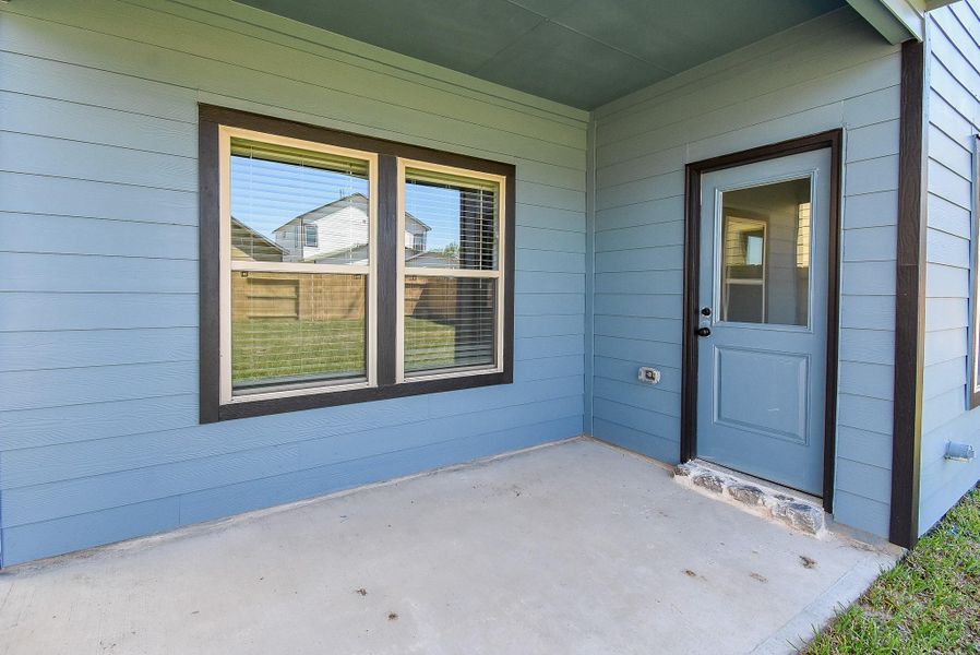 Exterior details and patio area of a home in Glendale Lakes, Arcola (Image 21).
