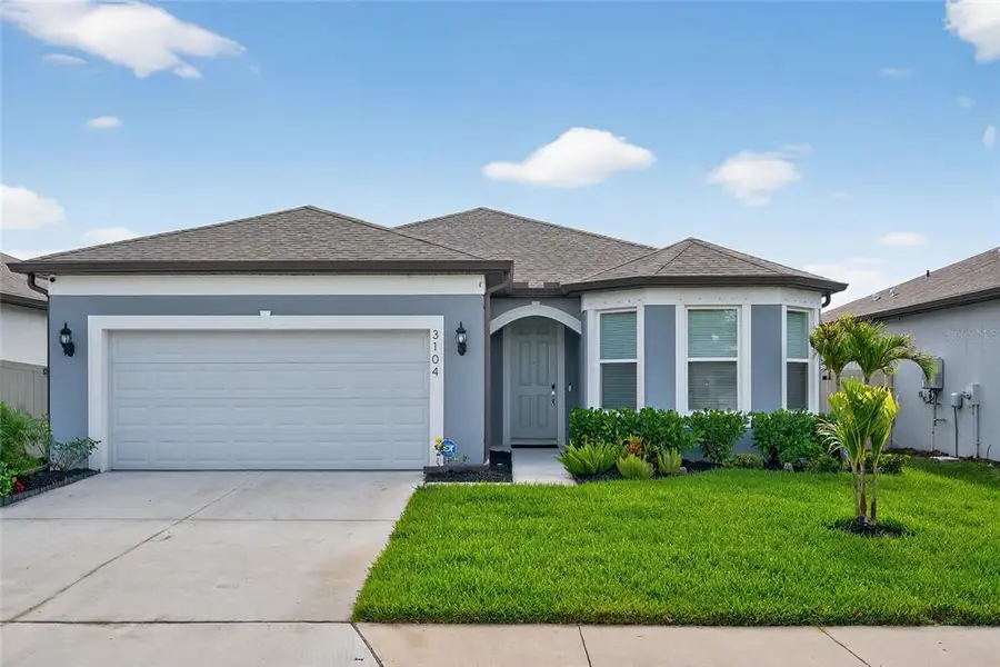 Front exterior of a new home in , Ellenton, FL, highlighting curb appeal (Image 33).