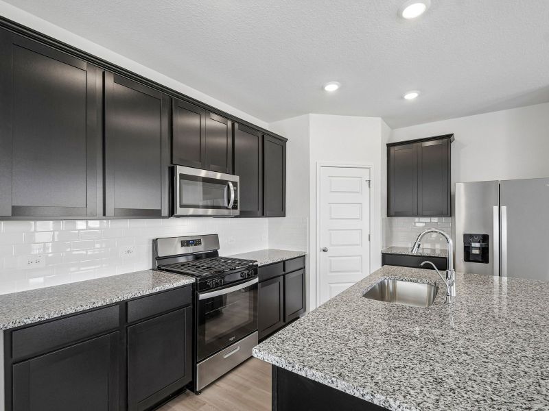 Furnished interior view inside a new home in Turner's Crossing - Americana Collection, Buda (Image 4).