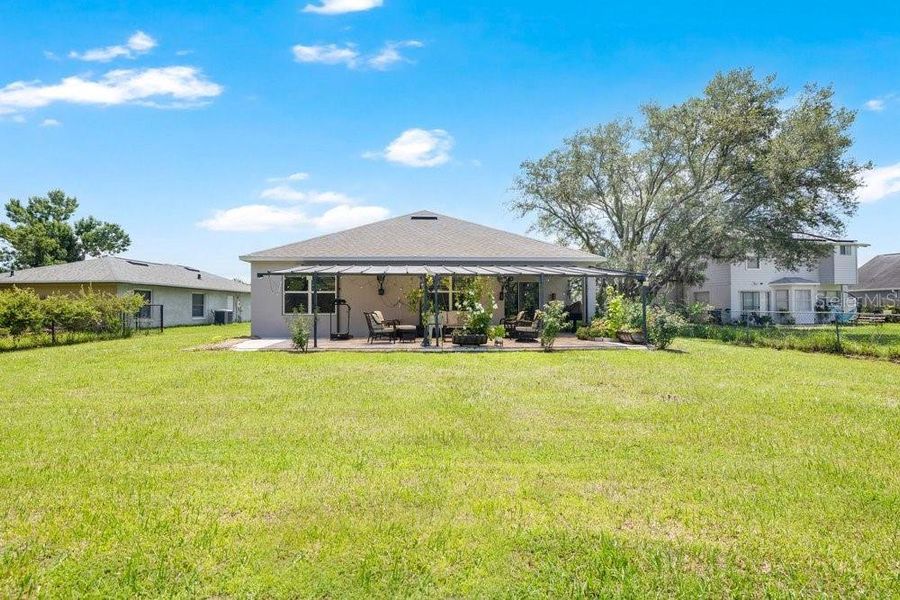 Exterior details and patio area of a home in Poinciana Enclave, Poinciana (Image 23).