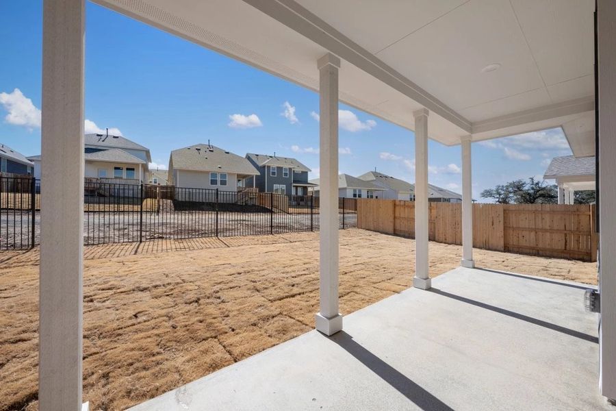 Exterior details and patio area of a home in Cannon Ranch, Dripping Springs (Image 4).