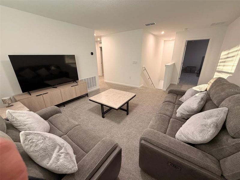 Furnished interior view inside a new home in Waterbrooke, Clermont (Image 13).