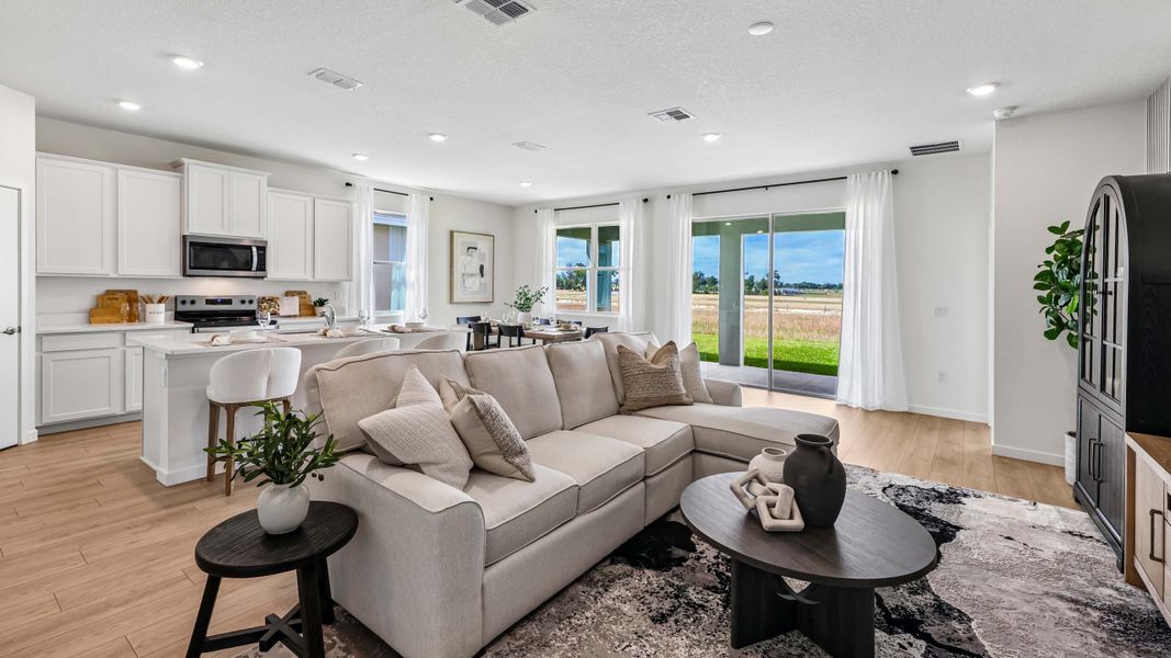 Furnished interior view inside a new home in Mockingbird Reserve at Winding Oaks, Ocala (Image 5).