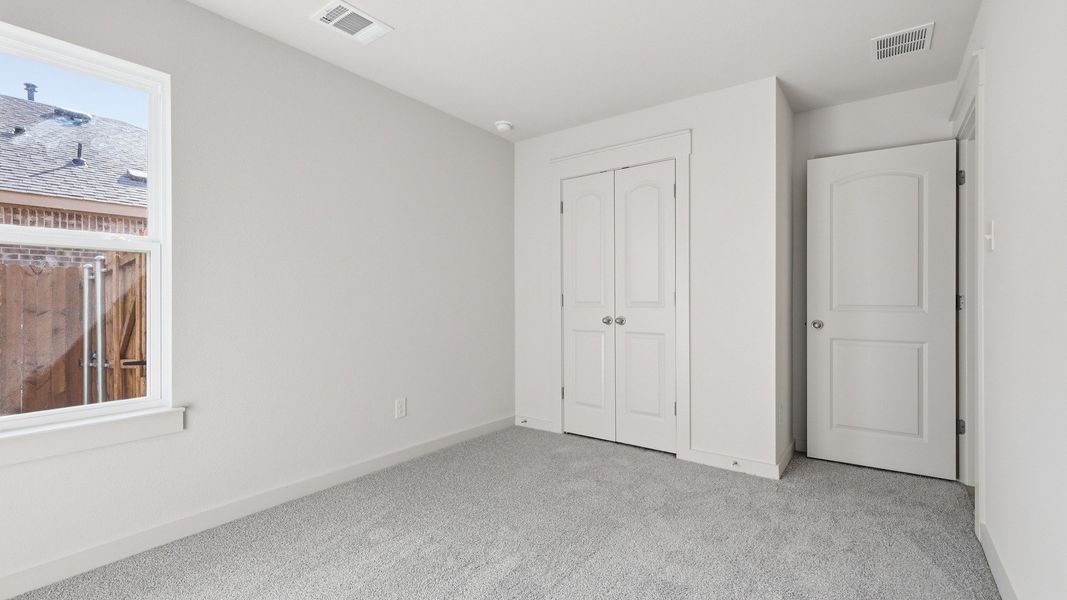 Furnished interior view inside a new home in Patriot Estates, Venus (Image 14).