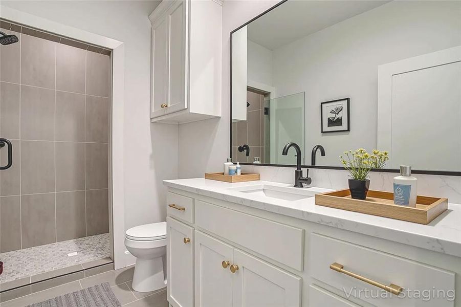 Full bathroom featuring vanity, a stall shower, and light tile patterned floors Full bathroom featuring vanity, a stall shower, and light tile patterned floors