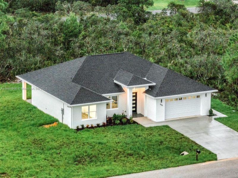Front exterior of a new home in , Sebring, FL, highlighting curb appeal (Image 1).