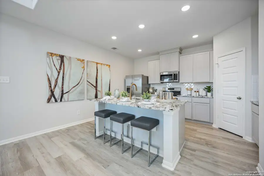 Furnished interior view inside a new home in Red Hawk Landing, San Antonio (Image 12).