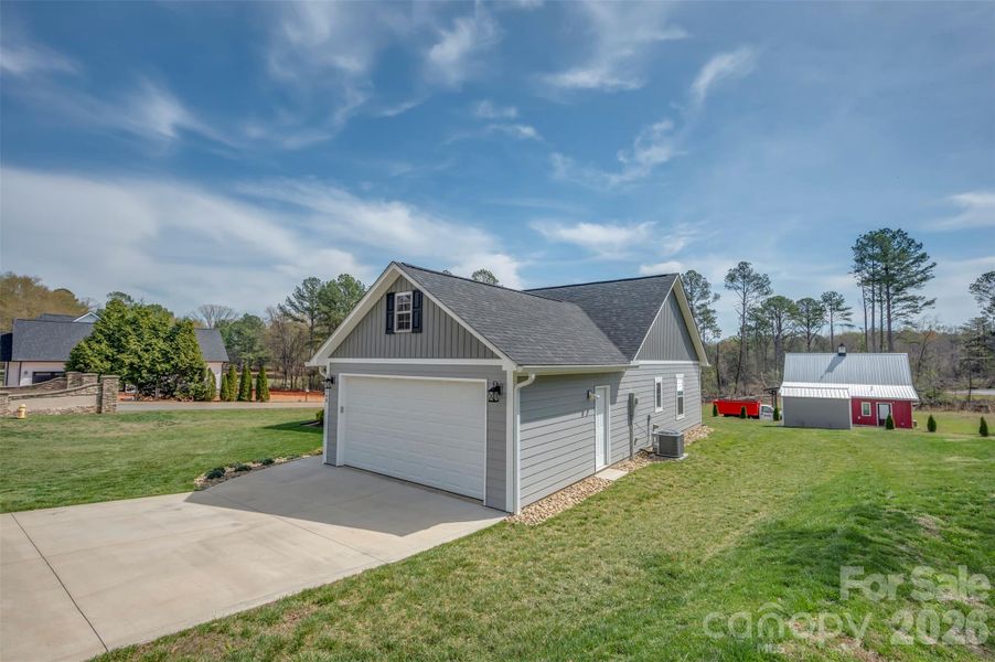 Front exterior of a new home in , Forest City, NC, highlighting curb appeal (Image 1). Front exterior of a new home in , Forest City, NC, highlighting curb appeal (Image 1).