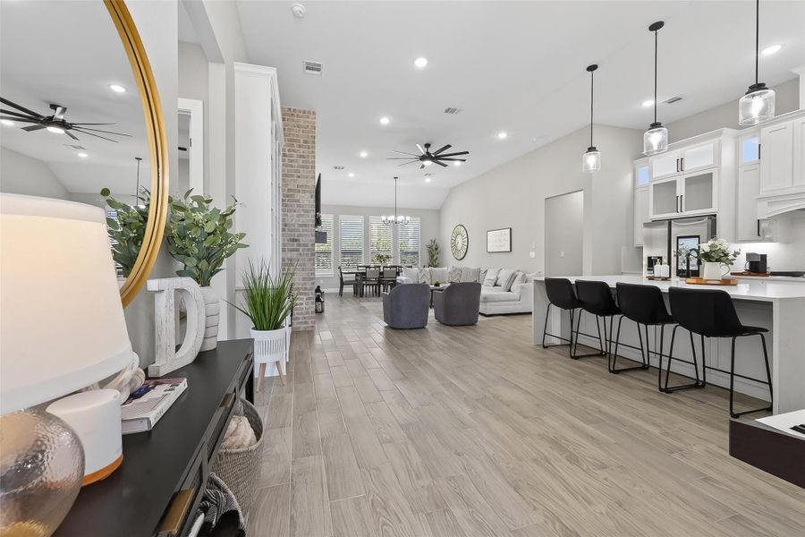 Open living area with high ceilings and expansive layout. Open living area with high ceilings and expansive layout.