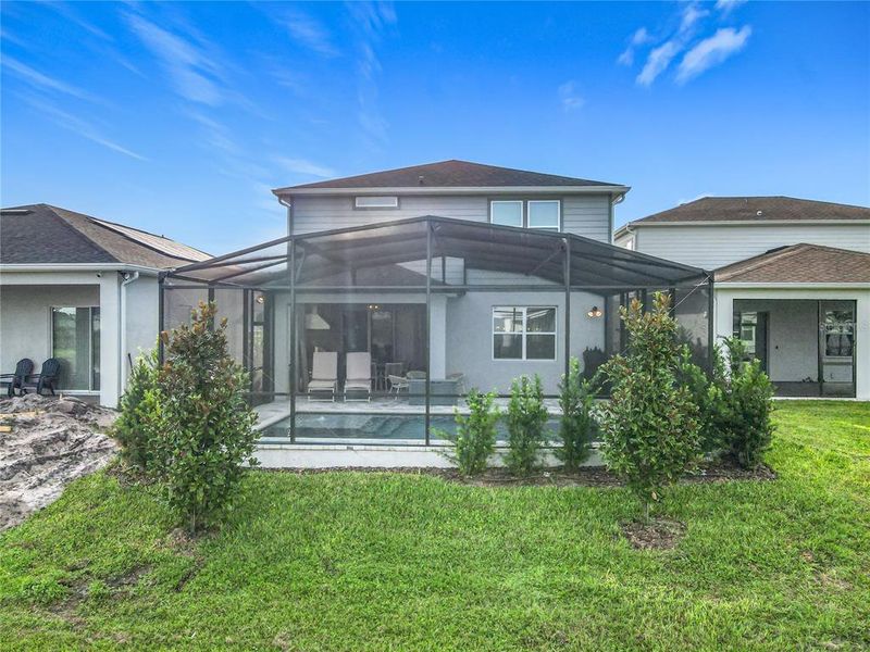 Front exterior of a new home in , Orlando, FL, highlighting curb appeal (Image 19).