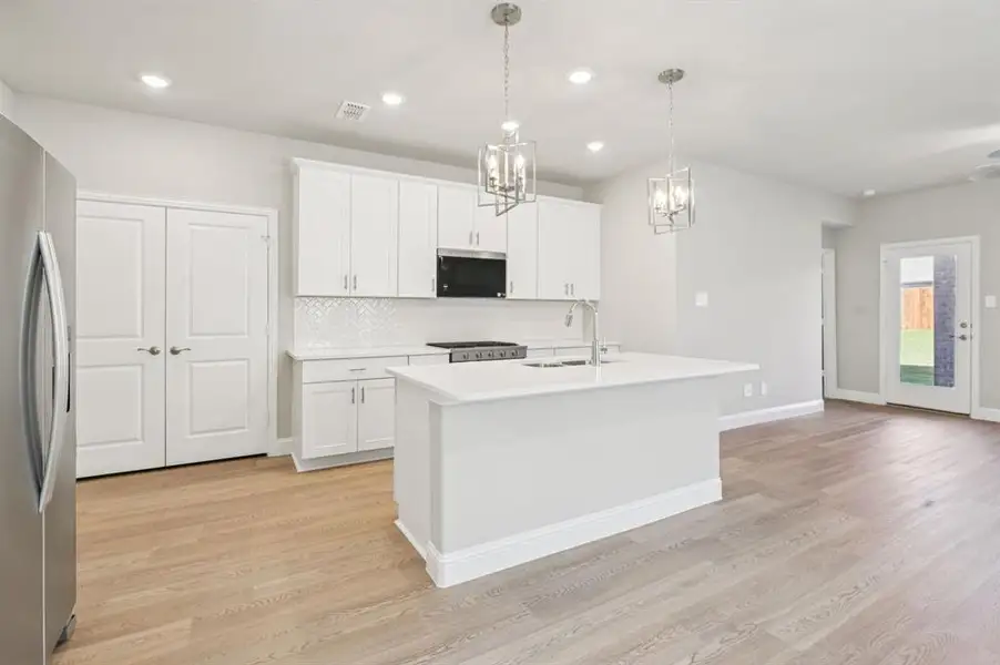 Photo is not of the actual home, but is an inspirational photo of builder’s model home and may depict options, furnishings, and/or decorator features that are not included.