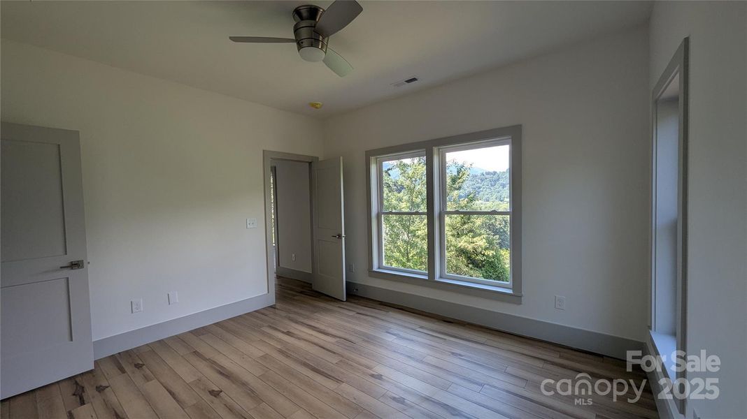 Spacious, unfurnished interior of a new home in , Waynesville (Image 7).