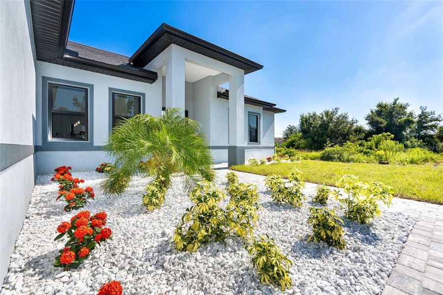 Front exterior of a new home in , Englewood, FL, highlighting curb appeal (Image 1). Front exterior of a new home in , Englewood, FL, highlighting curb appeal (Image 1).