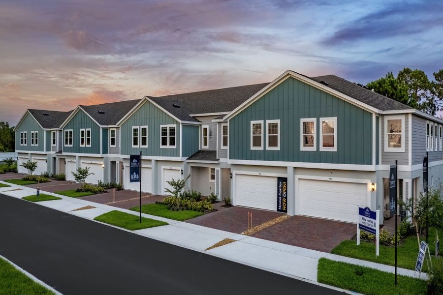 Front exterior of a new home in Blue Springs Reserve Townhomes, Groveland, FL, highlighting curb appeal (Image 11).