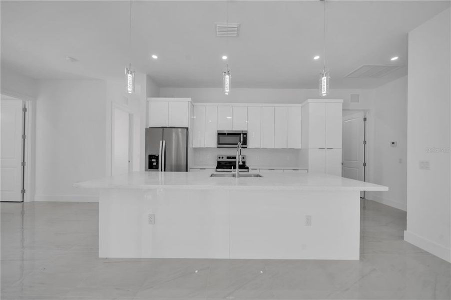 Furnished interior view inside a new home in , Lehigh Acres (Image 5). Furnished interior view inside a new home in , Lehigh Acres (Image 5).