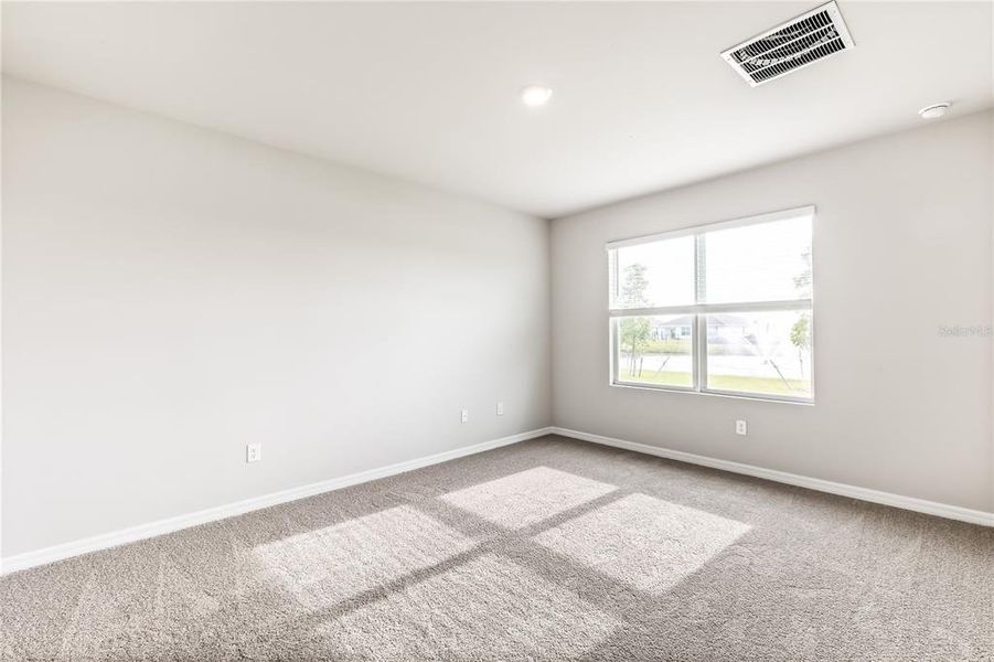 Spacious, unfurnished interior of a new home in Seagrass, Punta Gorda (Image 13).