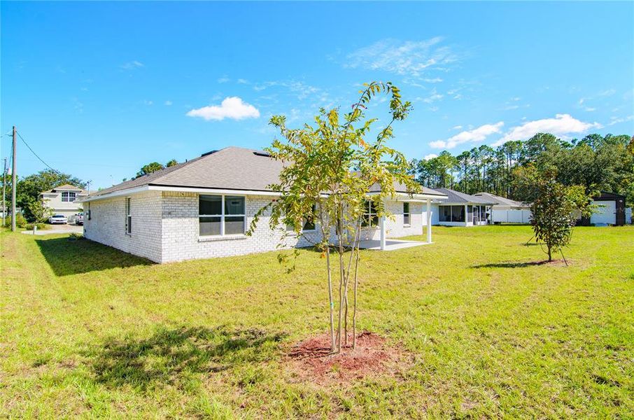 Exterior details and patio area of a home in Palm Coast, Palm Coast (Image 18). Exterior details and patio area of a home in Palm Coast, Palm Coast (Image 18).