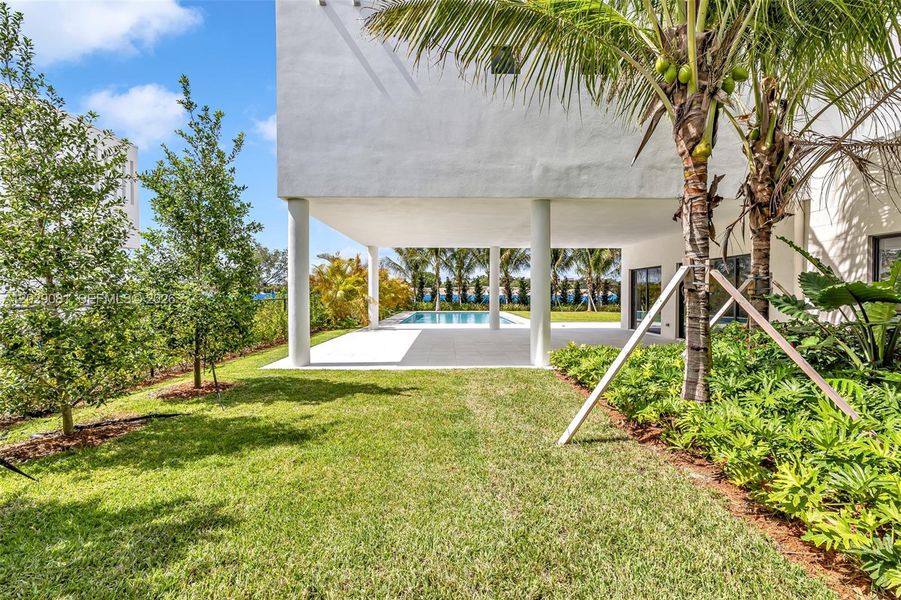 Exterior details and patio area of a home in , Weston (Image 27).