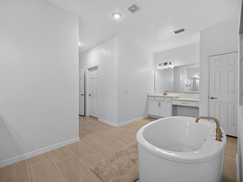 Furnished interior view inside a new home in Storey Creek, Kissimmee (Image 12).