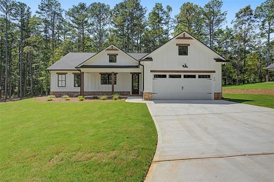 Front exterior of a new home in , Dallas, GA, highlighting curb appeal (Image 1). Front exterior of a new home in , Dallas, GA, highlighting curb appeal (Image 1).