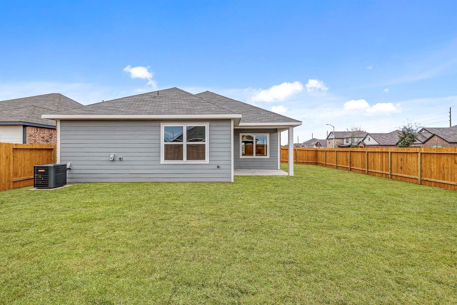 Front exterior of a new home in Freeman Ranch, Katy, TX, highlighting curb appeal (Image 2).