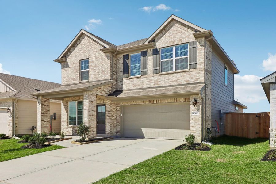 Front exterior of a new home in Sanford Farms - Premier Series, Waller, TX, highlighting curb appeal (Image 26).
