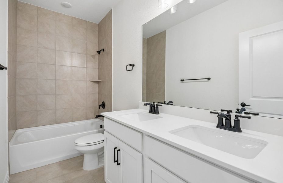 Furnished interior view inside a new home in Highland Lakes, McKinney (Image 10).