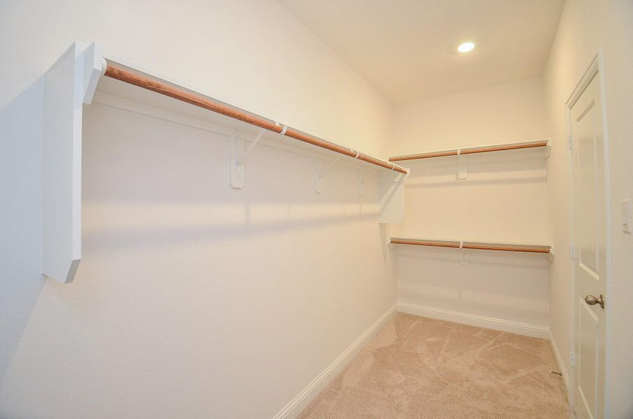 Spacious, unfurnished interior of a new home in Sienna 40', Missouri City (Image 30).