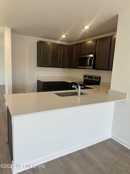 Furnished interior view inside a new home in Rookery, Green Cove Springs (Image 13).