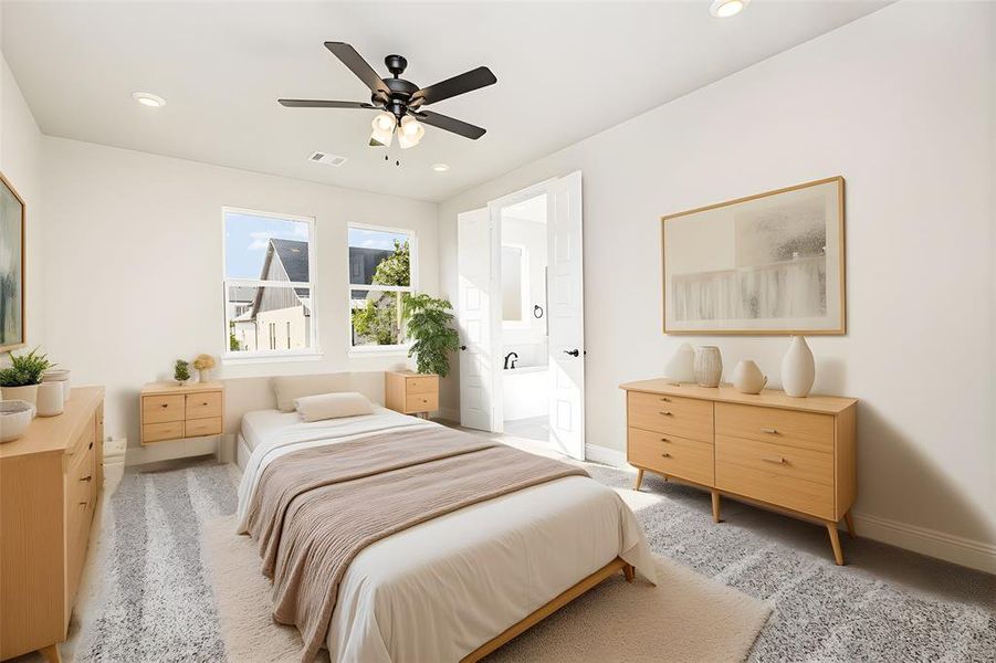 Bedroom with light carpet, ceiling fan, and recessed lighting
