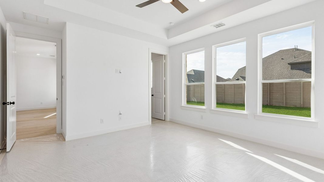 Representative unfurnished interior of a home built from the Chapelle III by Normandy Homes in Rainwater Crossing, Celina (Image 15).