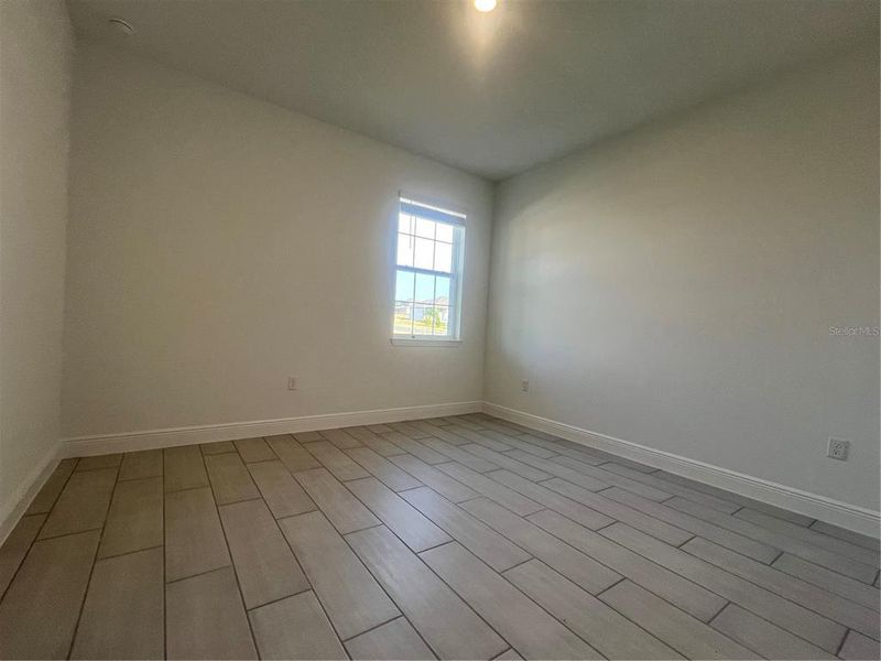 Spacious, unfurnished interior of a new home in Hills of Minneola, Minneola (Image 11).