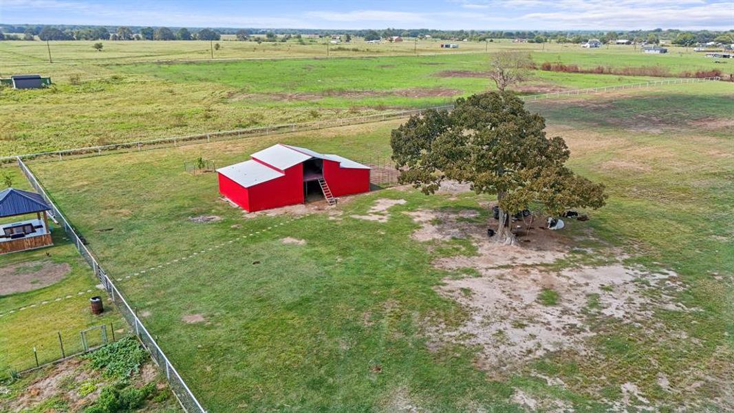 Aerial view of sparsely populated area featuring agricultural land Aerial view of sparsely populated area featuring agricultural land