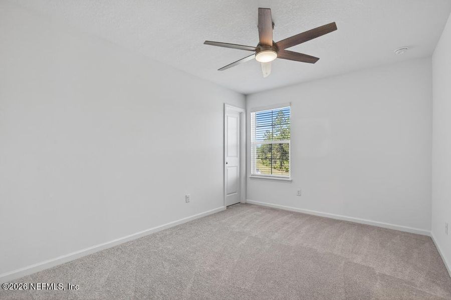 Spacious, unfurnished interior of a new home in St Augustine Lakes, St. Augustine (Image 26).