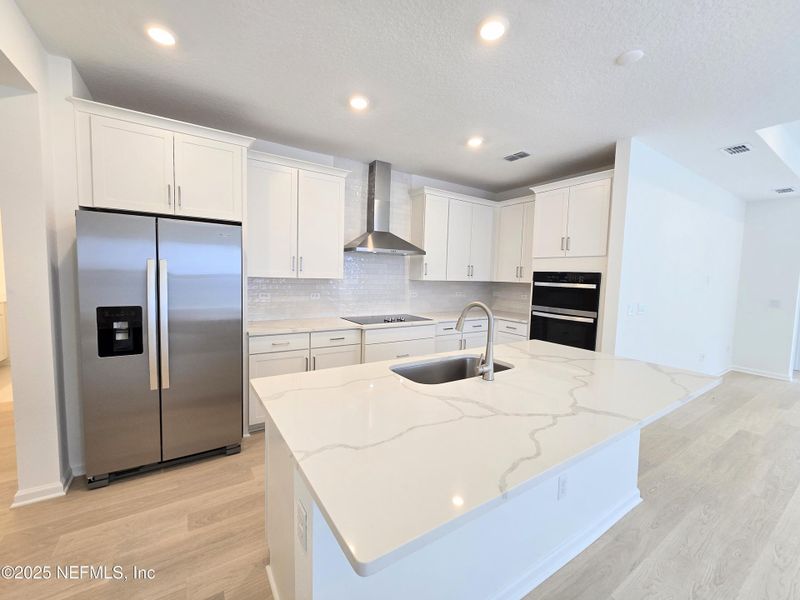 Furnished interior view inside a new home in Hyland Trail, Middleburg (Image 10).