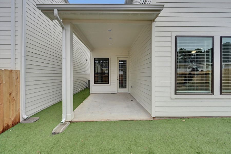 Exterior details and patio area of a home in Summer Place 35', Montgomery (Image 3). Exterior details and patio area of a home in Summer Place 35', Montgomery (Image 3).