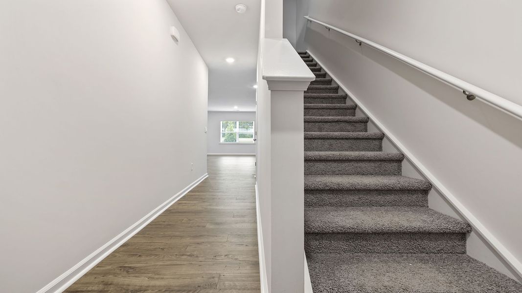 Spacious, unfurnished interior of a new home in Tanglewood Townes, Greenville (Image 17).