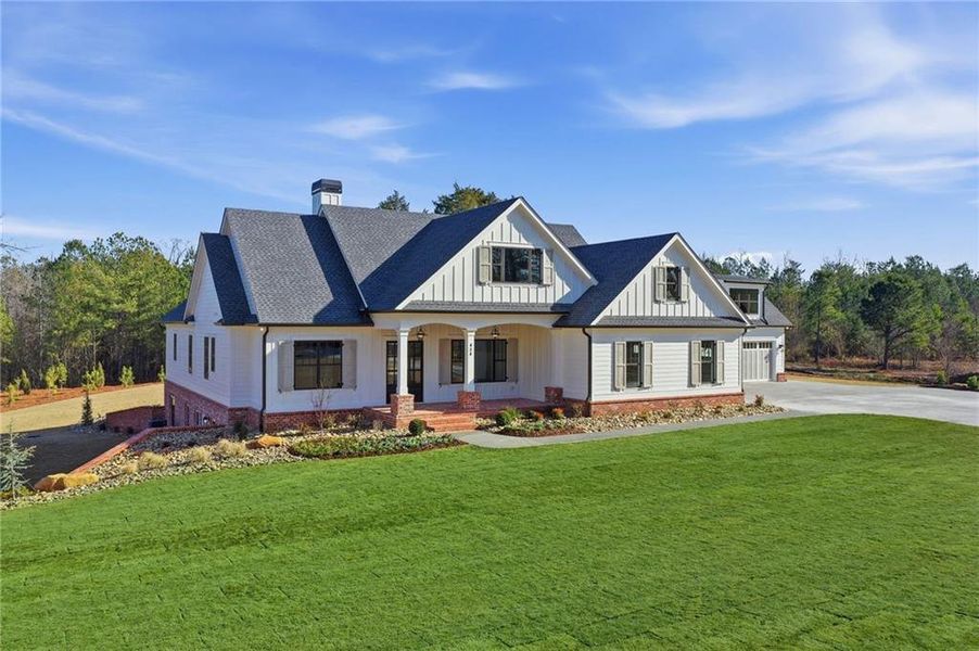 Front exterior of a new home in , White, GA, highlighting curb appeal (Image 31). Front exterior of a new home in , White, GA, highlighting curb appeal (Image 31).