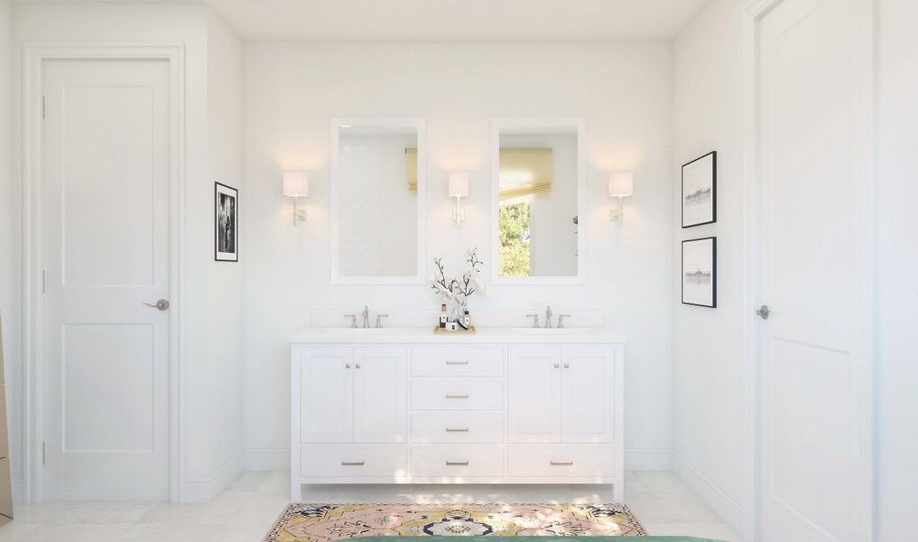 Primary bath with dual sinks and chrome fixtures throughout