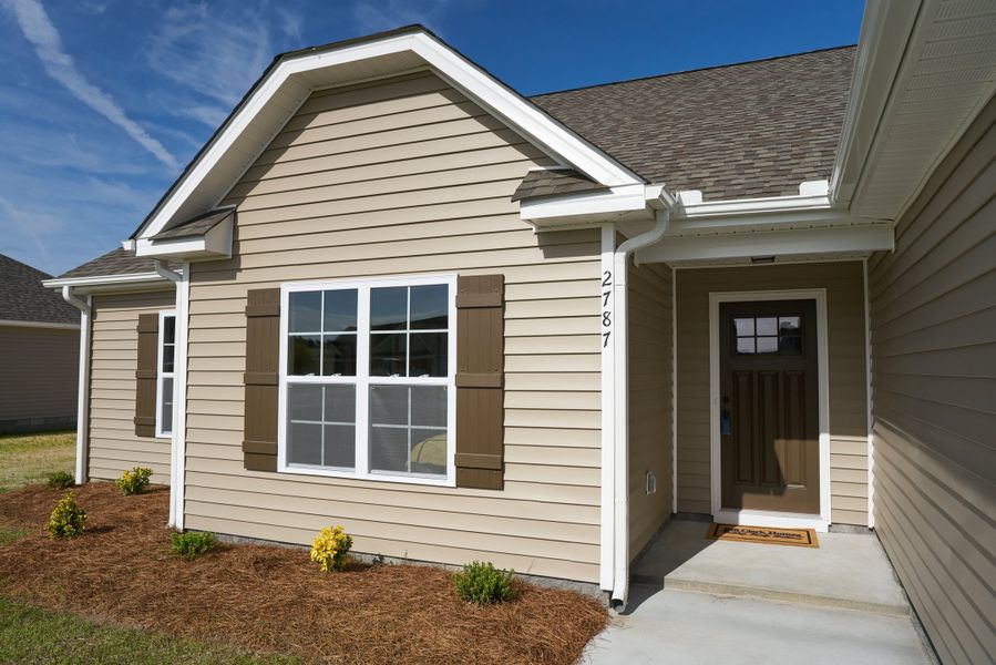 Representative exterior photo of a completed home built from the Ivy by Bill Clark Homes in Davenport Farms, Winterville, NC (Image 27). Representative exterior photo of a completed home built from the Ivy by Bill Clark Homes in Davenport Farms, Winterville, NC (Image 27).