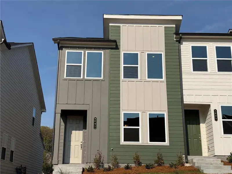 Front exterior of a new home in Park Vue, Atlanta, GA, highlighting curb appeal (Image 1). Front exterior of a new home in Park Vue, Atlanta, GA, highlighting curb appeal (Image 1).