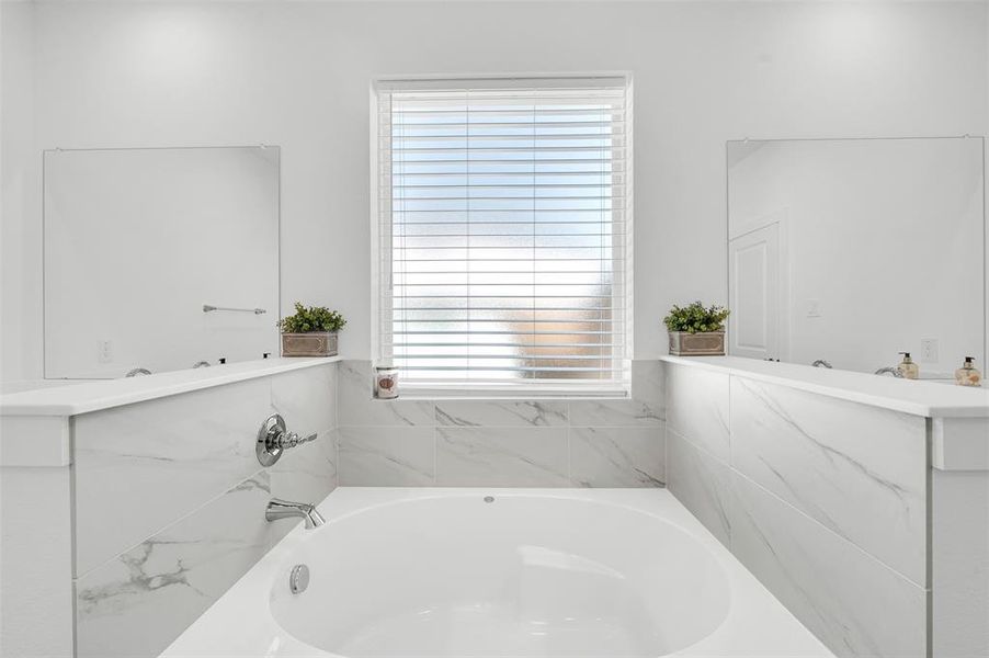 Bathroom featuring a bath