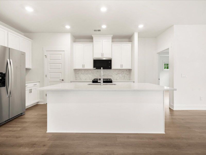 Furnished interior view inside a new home in The Coves at Lakes of Cane Bay, Summerville (Image 6).
