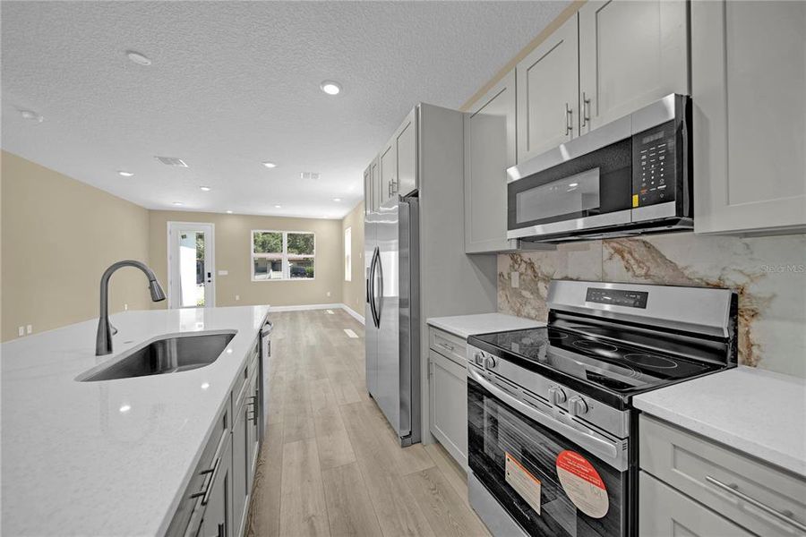 Furnished interior view inside a new home in , Winter Garden (Image 3).