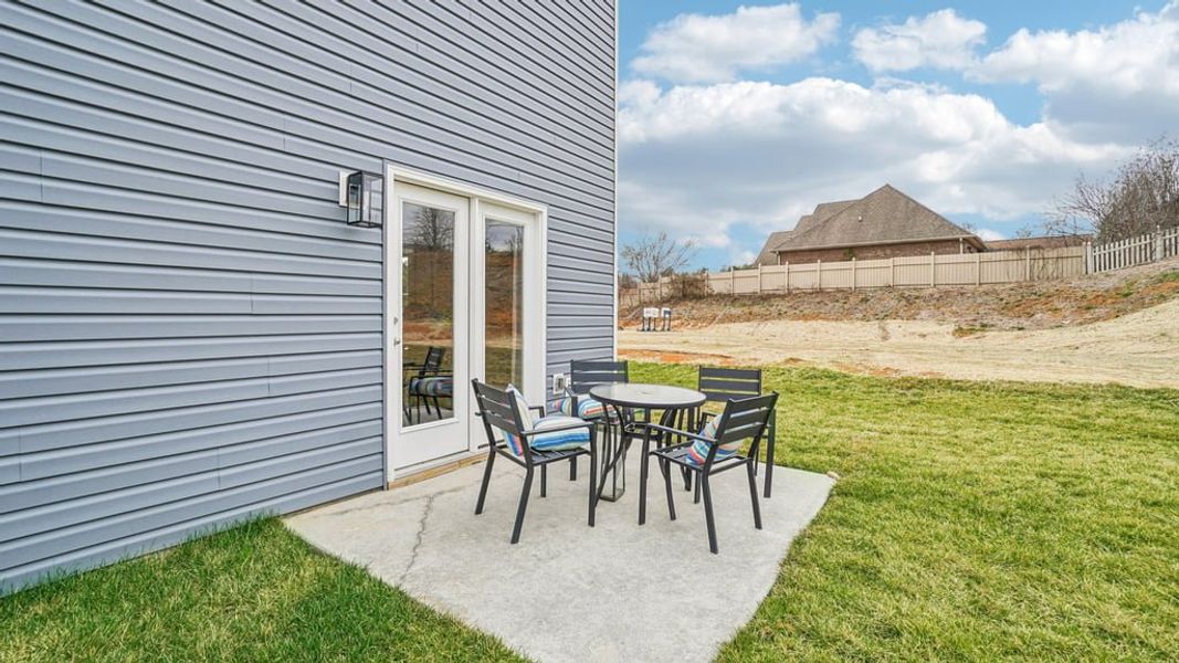 Exterior details and patio area of a home in Beechwood Meadows, Johnson City (Image 2).