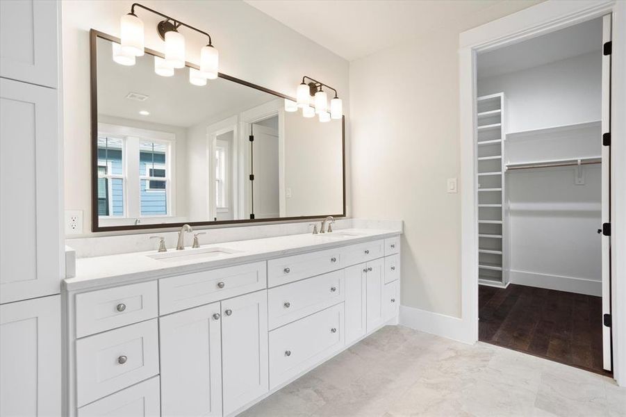 Bathroom with hardwood / wood-style floors and vanity